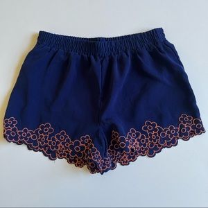 Blue shorts with floral embroidery